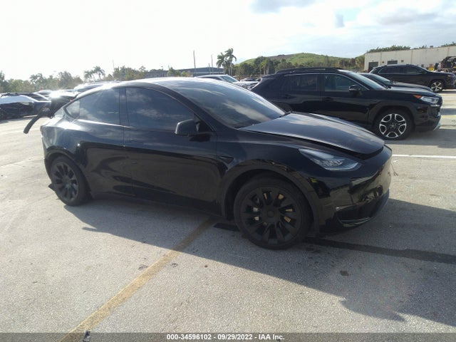 2021 Tesla Model Y, VIN: 5YJYGDED6MF116134
