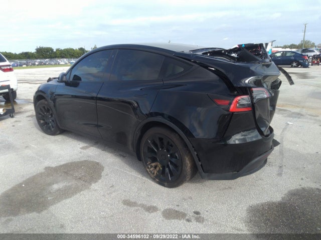 2021 Tesla Model Y, VIN: 5YJYGDED6MF116134