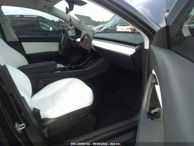 2021 Tesla Model Y, VIN: 5YJYGDED6MF116134