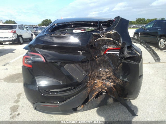 2021 Tesla Model Y, VIN: 5YJYGDED6MF116134