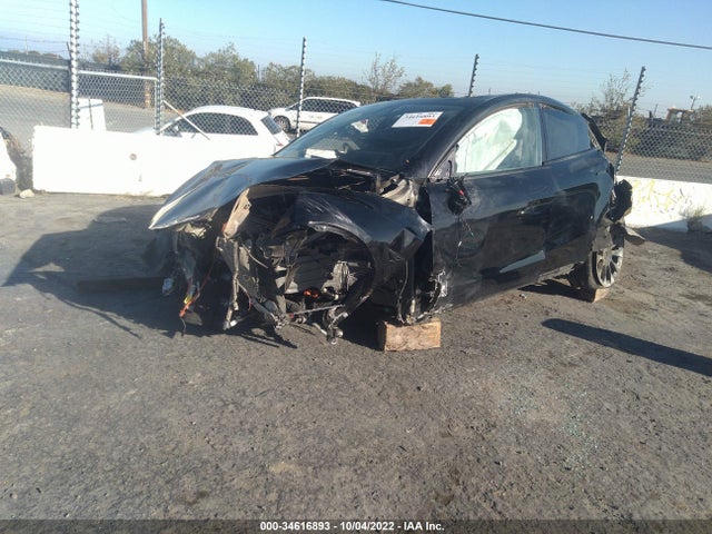 Tesla Model Y 2021 5YJYGAEE9MF217854 Image 2