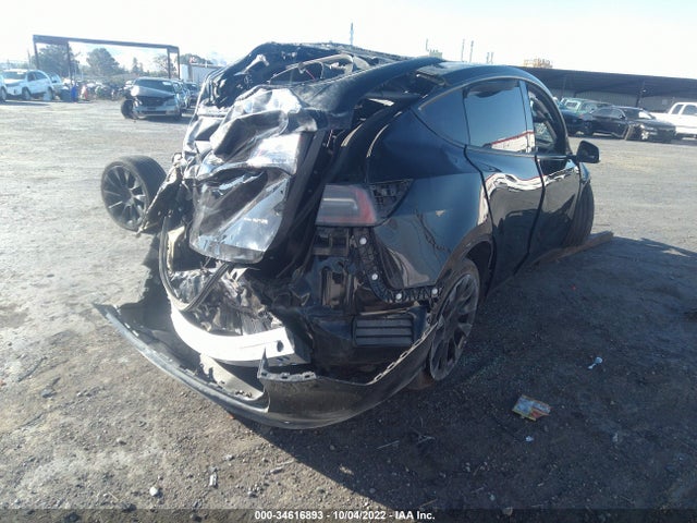 Tesla Model Y 2021 5YJYGAEE9MF217854 Image 5