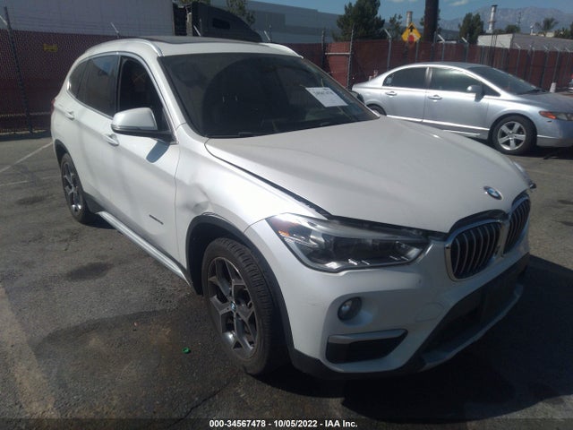 2016 BMW X1, VIN: WBXHT3C33GP886854
