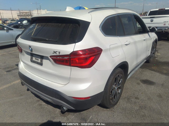 2016 BMW X1, VIN: WBXHT3C33GP886854