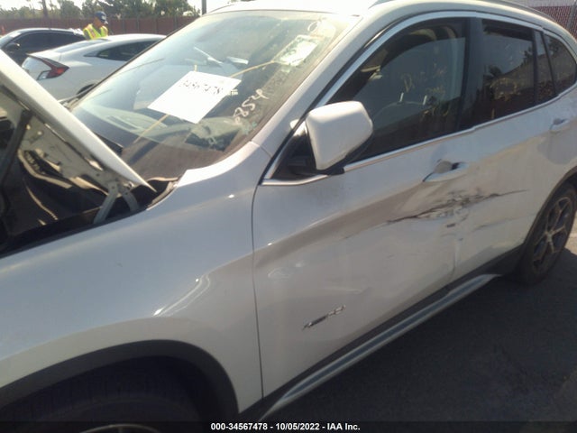 2016 BMW X1, VIN: WBXHT3C33GP886854