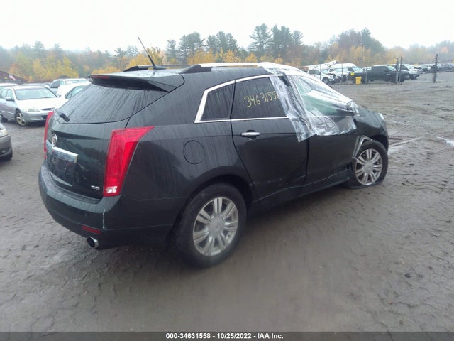 2014 Cadillac SRX, VIN: 3GYFNEE32ES587842