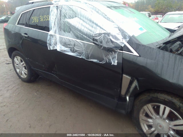 2014 Cadillac SRX, VIN: 3GYFNEE32ES587842