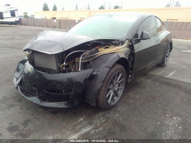 Tesla Model 3 Standard Range Plus 2021 5YJ3E1EA2MF943018 Image 2