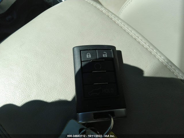 2014 Cadillac SRX, VIN: 3GYFNBE33ES546697