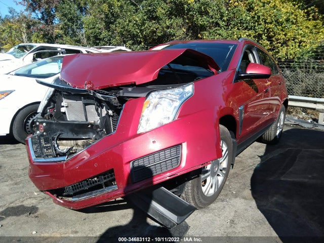 2014 Cadillac SRX, VIN: 3GYFNBE33ES546697
