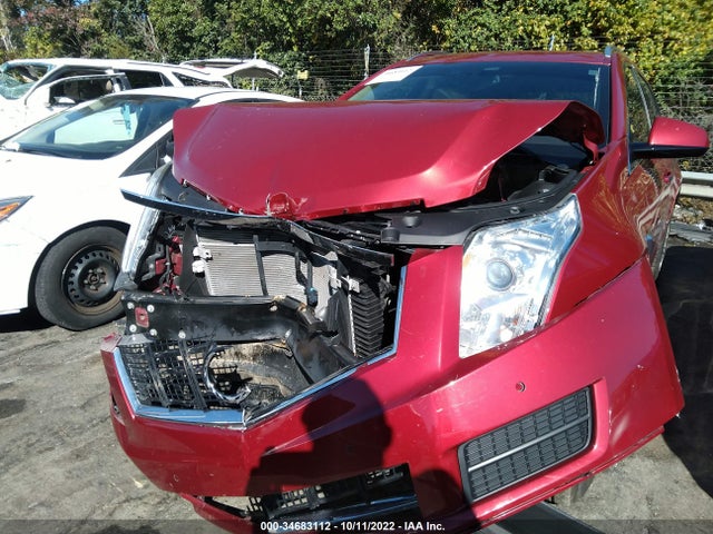 2014 Cadillac SRX, VIN: 3GYFNBE33ES546697
