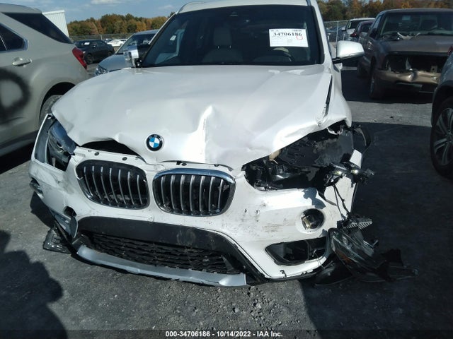 2019 BMW X1, VIN: WBXHT3C54K5N38700
