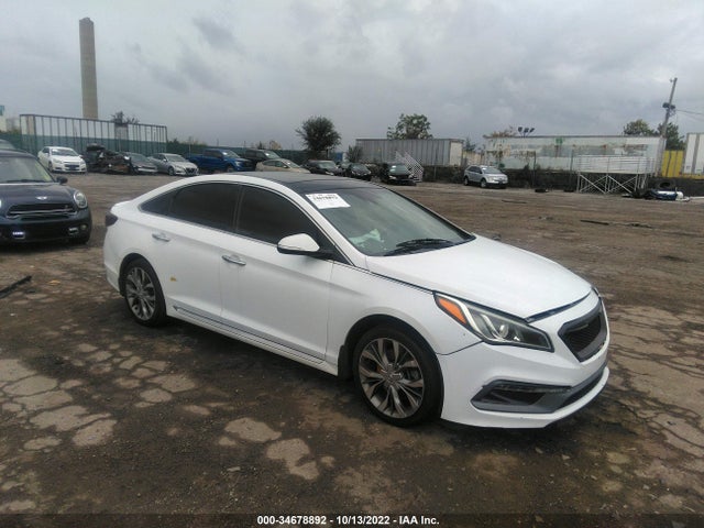2015 5NPE34AB2FH144195 main image