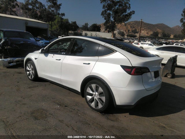 Tesla Model Y Standard Range 2021 5YJYGDED9MF133204 Image 4