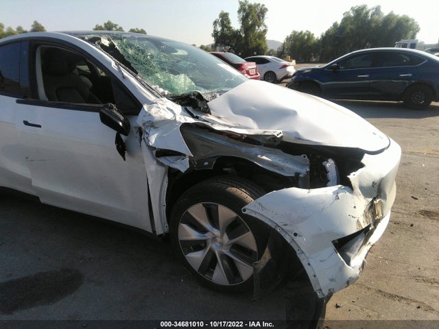 Tesla Model Y Standard Range 2021 5YJYGDED9MF133204 Image 7