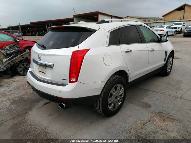 2015 Cadillac SRX, VIN: 3GYFNBE39FS569161