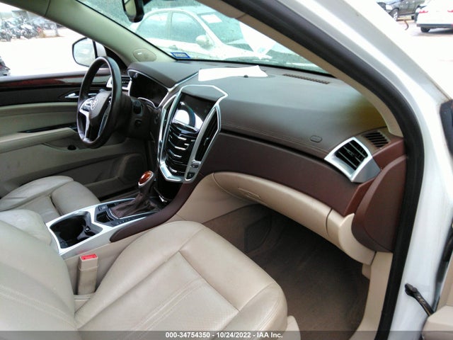 2015 Cadillac SRX, VIN: 3GYFNBE39FS569161