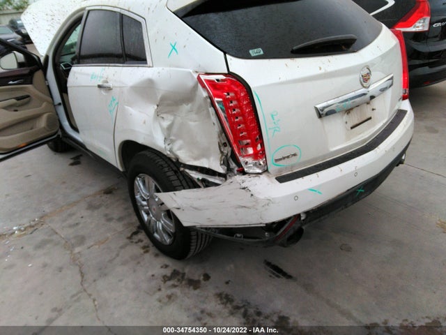 2015 Cadillac SRX, VIN: 3GYFNBE39FS569161