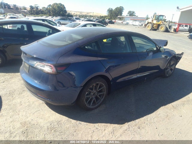 Tesla Model 3 Standard Range Plus 2021 5YJ3E1EA7MF084329 Image 4