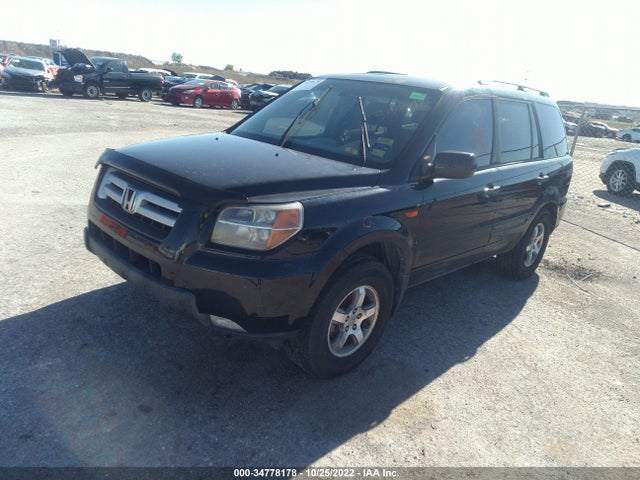 2007 HONDA PILOT EX-L VIN: 2HKYF18557H533756
