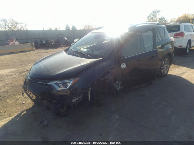 2016 Toyota RAV4, VIN: JTMRJREV9GD032672