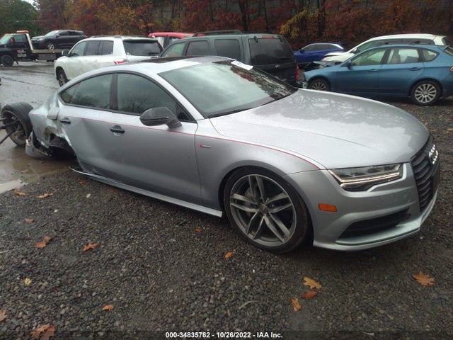 2016 Audi A7, VIN: WAUWGAFC9GN101271