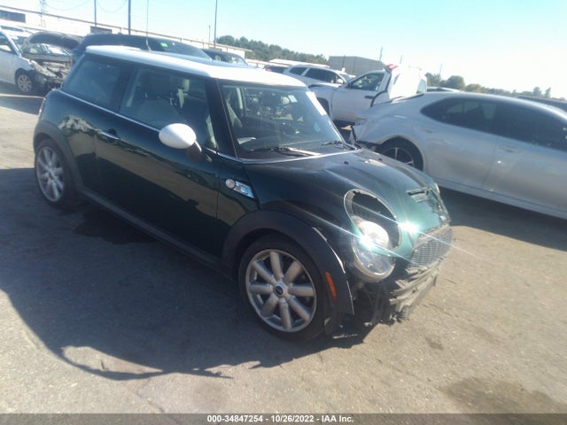 2009 MINI COOPER HARDTOP S VIN: WMWMF73579TT99594