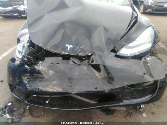 Tesla Model Y 2021 5YJYGAEE4MF138480 Image 6