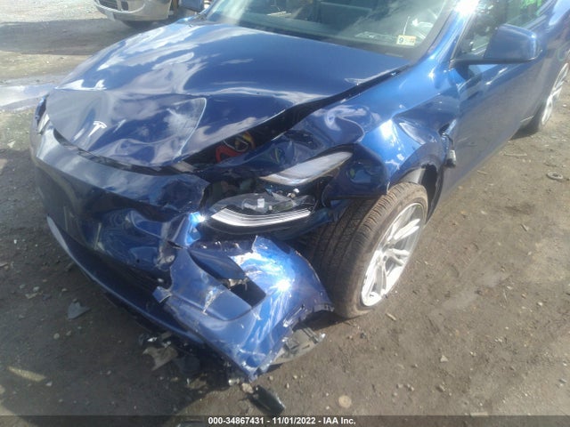 Tesla Model Y 2021 5YJYGAEE5MF257946 Image 7