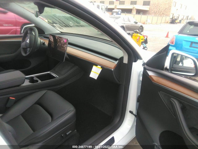 2023 Tesla Model Y, VIN: 7SAYGDEF6PF586009