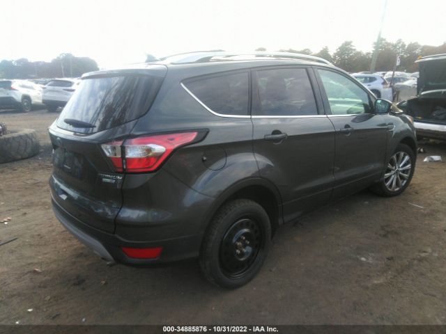 2018 FORD ESCAPE VIN 1FMCU9J90JUC43963 | История продажи