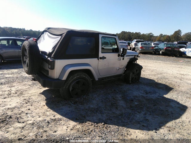 2010 JEEP WRANGLER SAHARA VIN: 1J4GA5D18AL123180