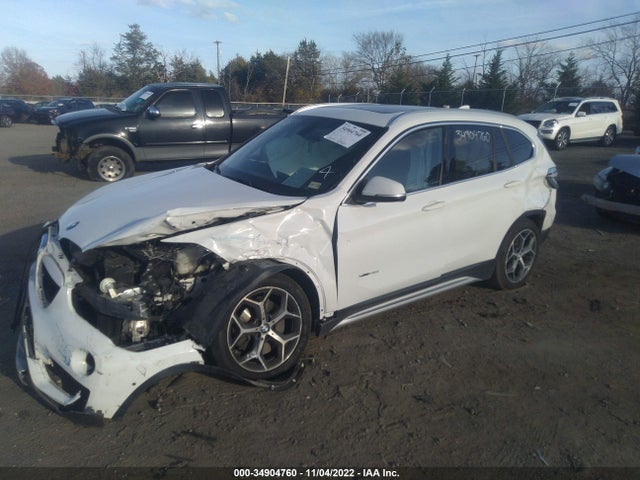 2017 BMW X1, VIN: WBXHT3C39H5F76627