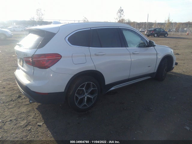 2017 BMW X1, VIN: WBXHT3C39H5F76627