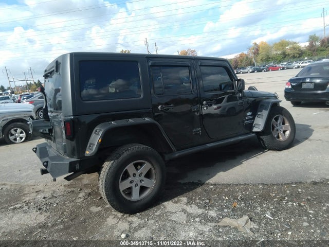 1C4HJWDG3GL330458 Jeep Wrangler Unlimited Sport