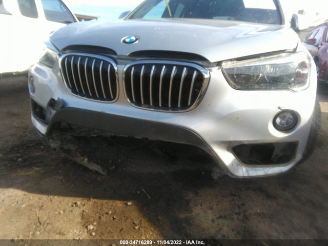 2018 BMW X1, VIN: WBXHU7C33J5H42568
