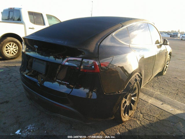 Tesla Model Y 2021 5YJYGDEE0MF195258 Image 4