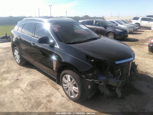 2014 Cadillac SRX, VIN: 3GYFNBE34ES562309