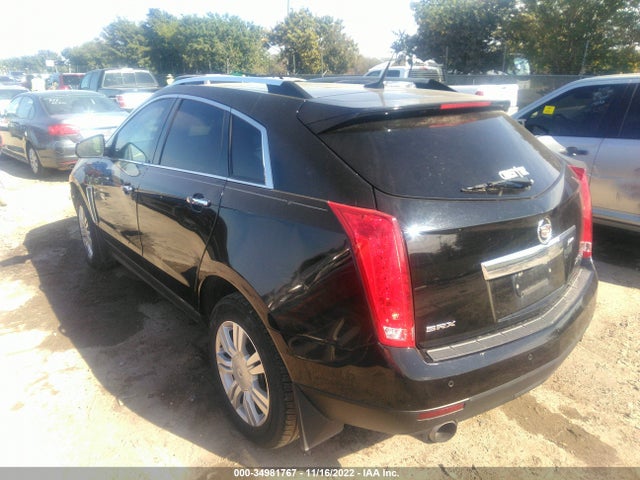 2014 Cadillac SRX, VIN: 3GYFNBE34ES562309