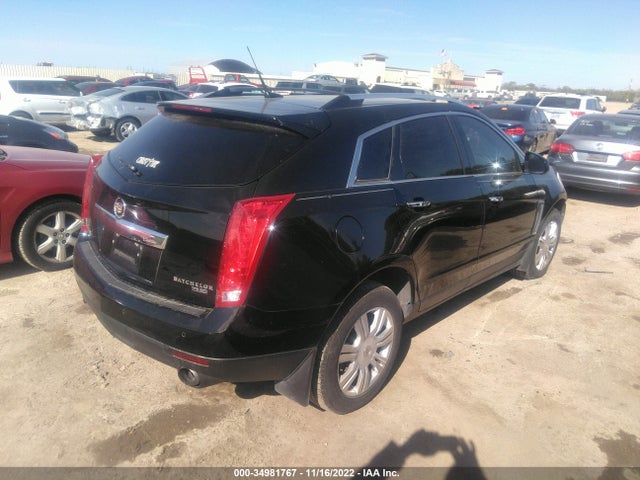 2014 Cadillac SRX, VIN: 3GYFNBE34ES562309