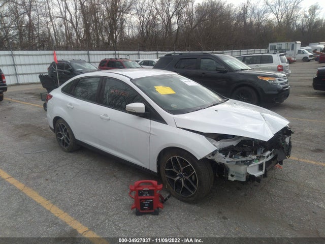 2018 Ford Focus, VIN: 1FADP3FE1JL203812