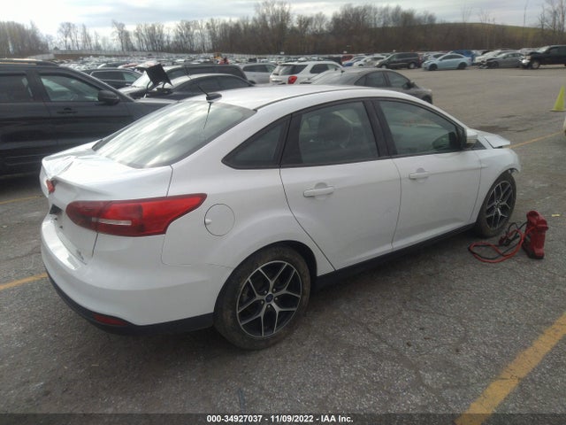 2018 Ford Focus, VIN: 1FADP3FE1JL203812