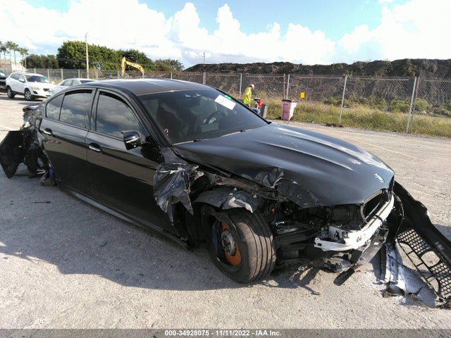 2018 BMW M5, VIN: WBSJF0C52JB283039