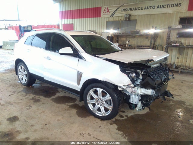 2015 Cadillac SRX, VIN: 3GYFNDE34FS556071