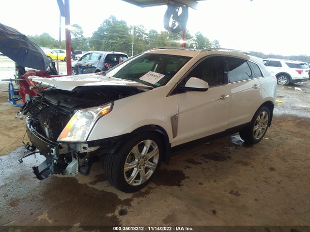 2015 Cadillac SRX, VIN: 3GYFNDE34FS556071