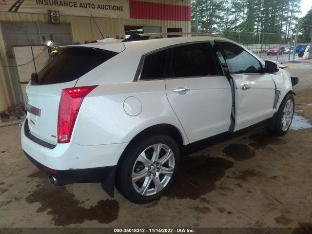 2015 Cadillac SRX, VIN: 3GYFNDE34FS556071