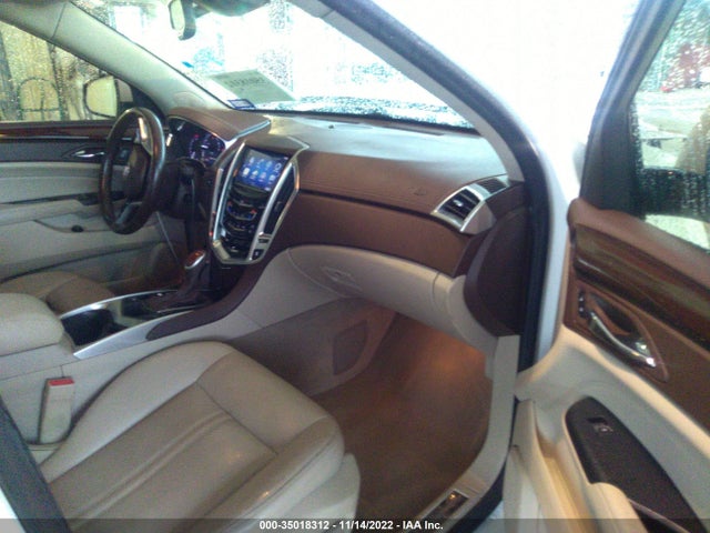 2015 Cadillac SRX, VIN: 3GYFNDE34FS556071