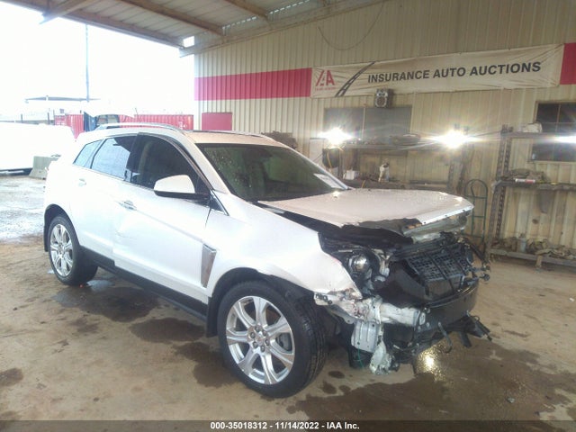 2015 Cadillac SRX, VIN: 3GYFNDE34FS556071