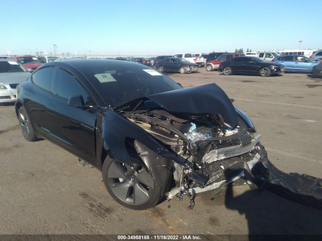 Tesla Model 3 Standard Range Plus 2021 5YJ3E1EA4MF071117 main image