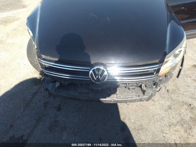 2014 VOLKSWAGEN TIGUAN SEL VIN: WVGAV3AX8EW558861